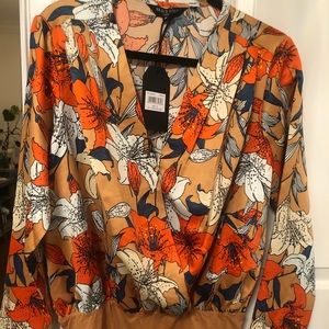 Brave Sole gold floral leotard.